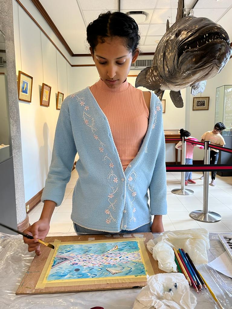 Artist at work in a bright studio